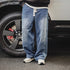 Vintage double-knee lumberjack jeans for men with distressed wide-leg design.